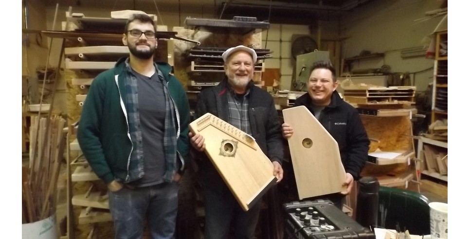 Taking a break from work in the d’Aigle Autoharps workshop to show off some of their instruments: Greg Olson, Pete Daigle and Keith Daigle Taking a break from work in the d’Aigle Autoharps workshop to show off some of their instruments: Greg Olson, Pete Daigle and Keith Daigle
